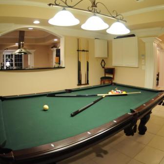 Pool room in Southern Basement Company basement finish.